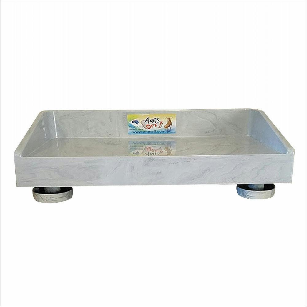 Ants off elevated feeding table